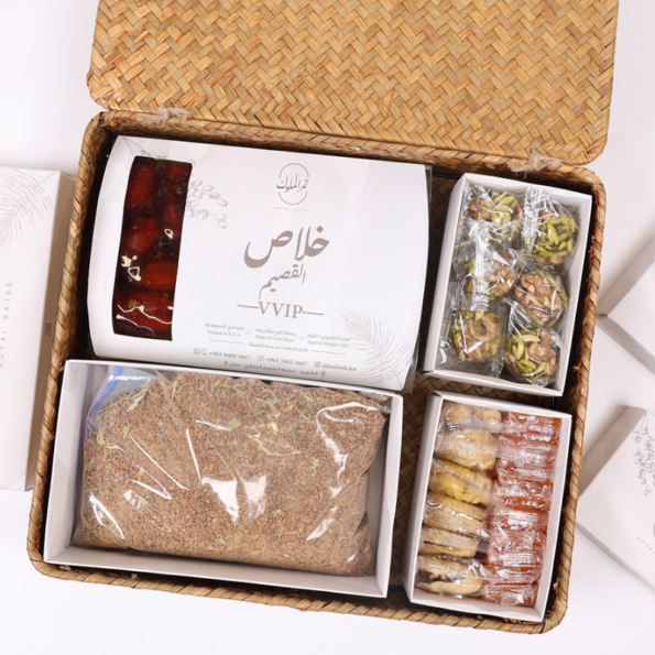 Half a kilo of Arabic coffee - Khalas Al-Qassim VVIP 1 kilo - Date with walnuts and pistachios 230 grams - Dried figs and dried apricots stuffed - with walnuts 120 grams Qamar Al-Din - 210 grams